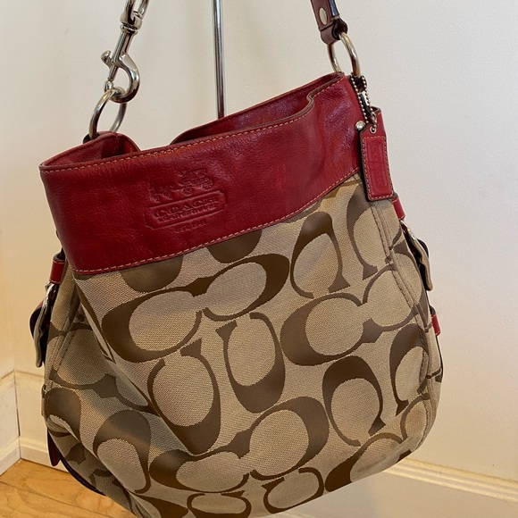 Coach Handbags - Signature Coach bag with red leather trim.